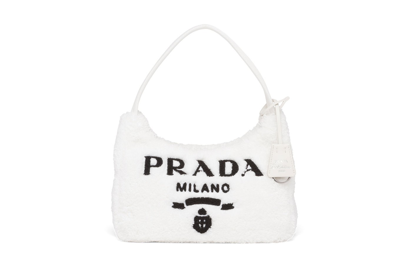 Prada выпустил вязаные сумки и топы-бра из денима для летнего отдыха (фото 9)