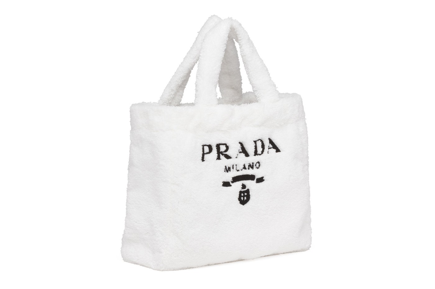 Prada выпустил вязаные сумки и топы-бра из денима для летнего отдыха (фото 10)